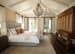 A luxury modern bedroom with antique pieces